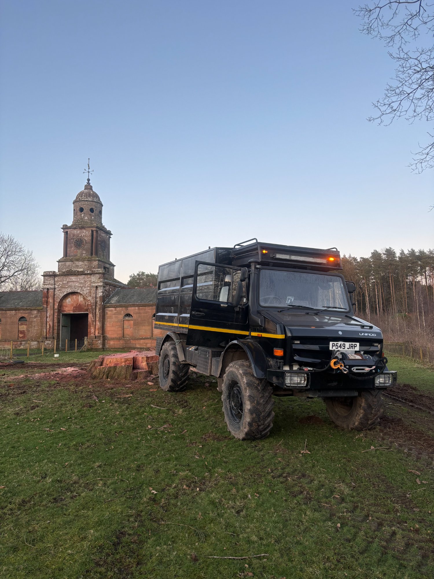Unimog U2150L38 at work on estate